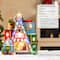 Glitzhome® 10.75" Lighted CHRISTMAS TOY MARKET Resin Village with Movement and Music